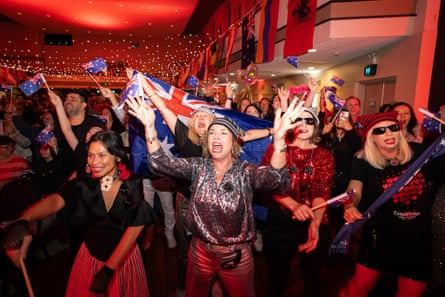 Crowds celebrate and cheer at Eurovision party