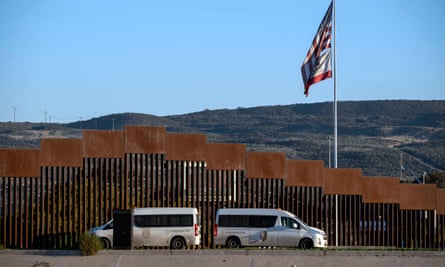 Mexican migration authorities guard one of the sides of the Tijuana River at the US-Mexico border.