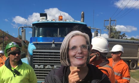 A protester with the Stop WestConnex campaign wears a mask of Australian prime minister Malcolm Turnbull’s wife Lucy’s face at a demonstration.