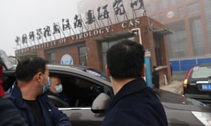 WHO staff arriving at the Wuhan Institute of Virology in February