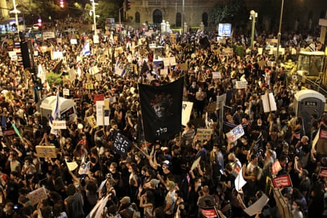 People attend a protest against Israeli prime minister Benjamin Netanyahu outside his residence in Jerusalem, Israel, on 25 July 2020. Netanyahu faces an ongoing trial with indictments filed against him by the State Attorney’s Office on a charges of fraud, bribery, and breach of trust.