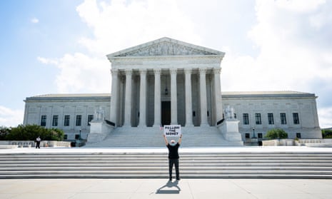 Bill Christeson protests outside the supreme court in Washington DC on Thursday.