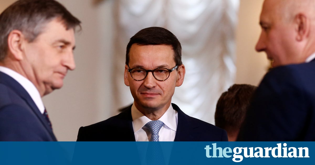 Poland's prime minister sacks ministers in move to mend ties with EU
