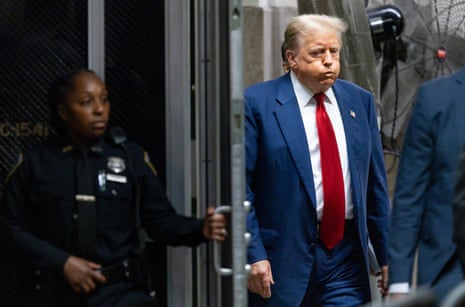 Donald Trump returns to the courtroom following a short break in his criminal trial at New York state supreme court on 30 April 2024.