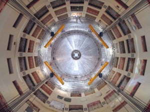 The first piece of the Iter tokamak being lowered into place.