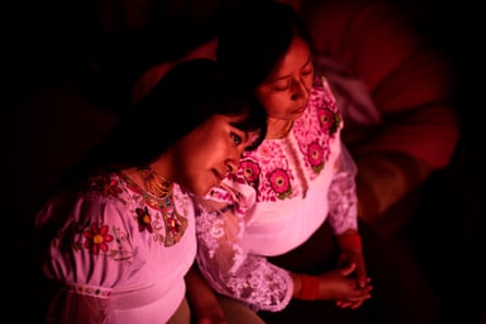 Katerine Pupiales (20) and Marisol Pupiales (27), two communitarian teachers, poses for a portrait in their home. Marisol volunteers at San Clemente school, teaching “kichwa” an indigenous native language