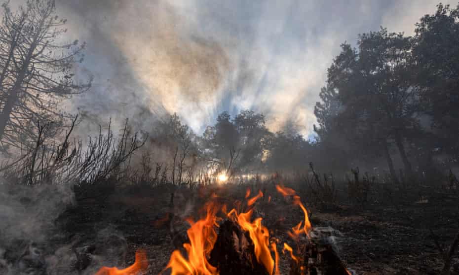 A fire during a warning of excessive hot weather in Cherry Valley, California, August 2020
