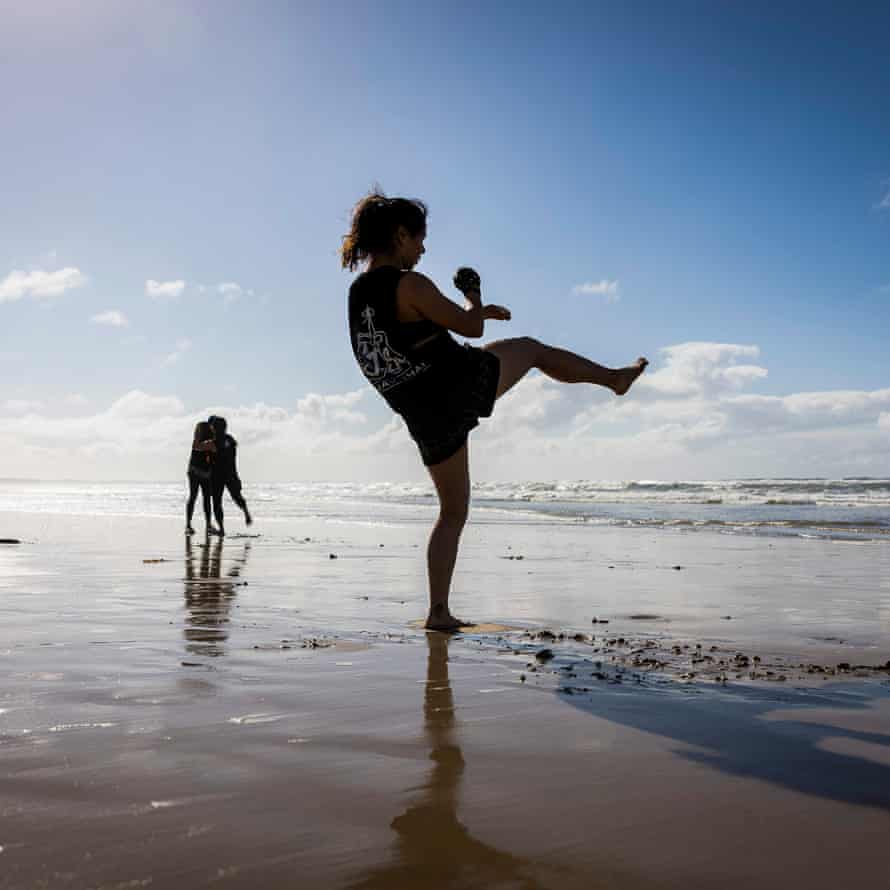 Deb Doan training alone on the beach