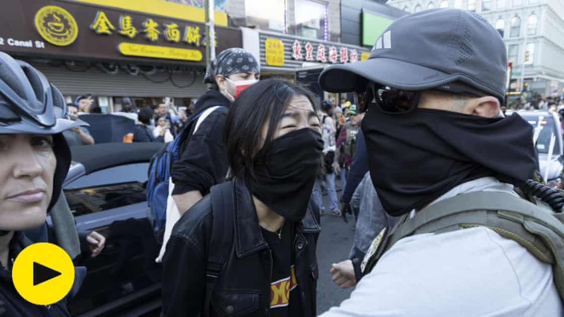 Protests erupt as Ice agents conduct raids in New York City's Chinatown – video