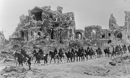 The British cavalry passing the remains of Albert Cathedral, after the second Battle of the Somme, August 1918.