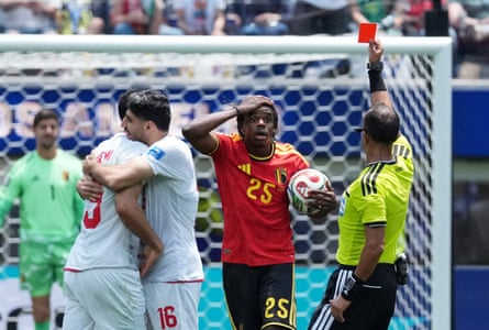 Belgium's Nathan Ngoy is sent disconnected against Iran