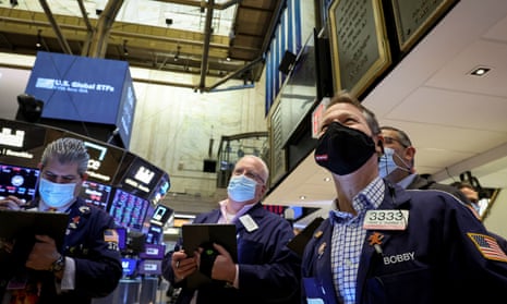 Traders on the floor of the New York stock exchange.
