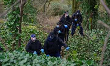 Police officers carry out searches at Kersal Dale, near Salford on Friday 5 April.