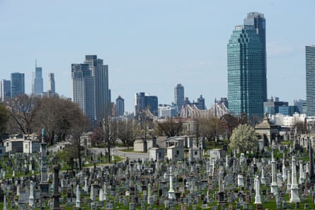 The New York city skyline pictured behind Calvary cemetery in Queens