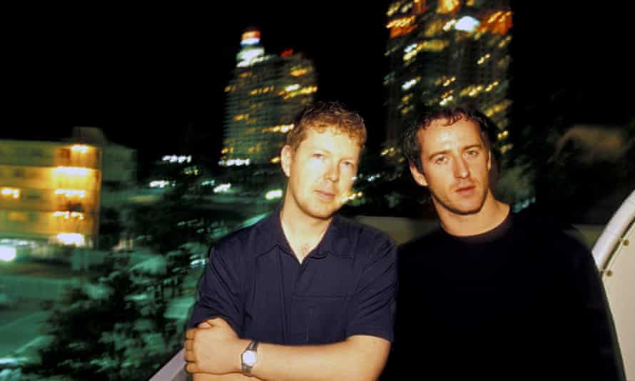 Jon Digweed and Sasha stand in front of Miami cityscape in 2000