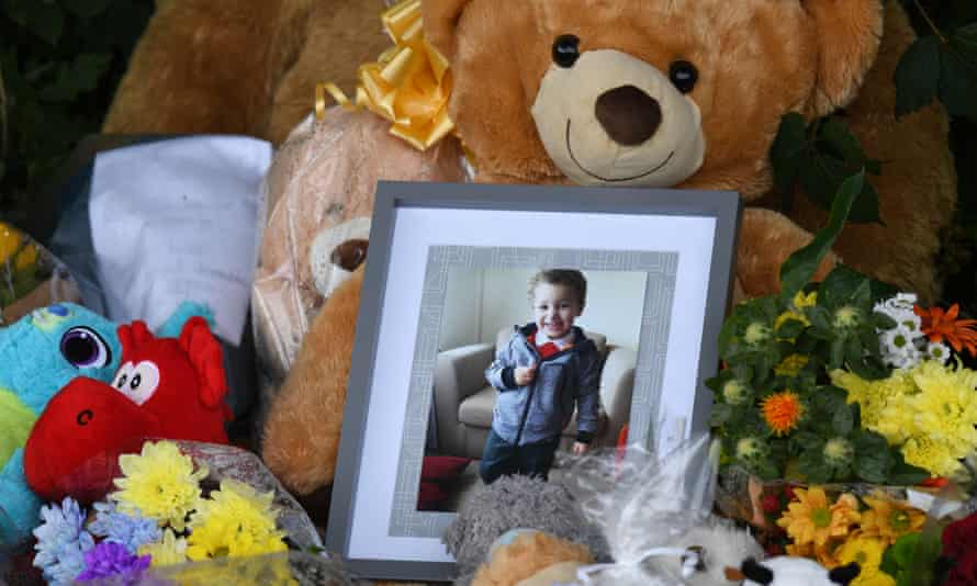 Logan Mwangi: vibrant child murdered after months of terror | Crime 2 A photo of Logan among floral tributes in Sarn in August 2021