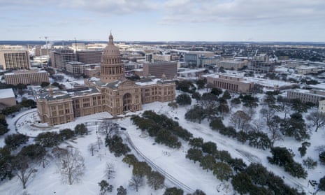 The Texas state capitol grounds in Austin covered in snow. Power issues in the state have endangered elderly, poor and disabled residents most.
