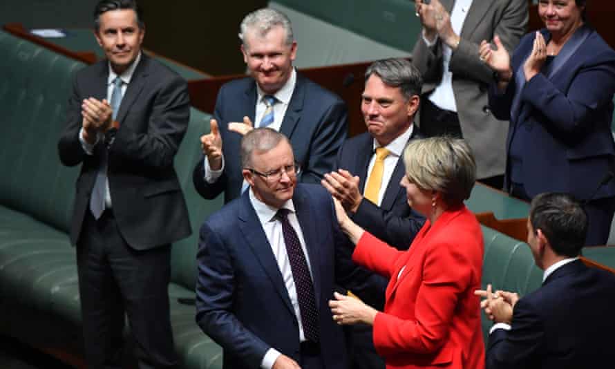 Labor leader Anthony Albanese is congratulated after he delivers his budget in reply speech in the House of Representatives at Parliament House on 13 May, 2021.