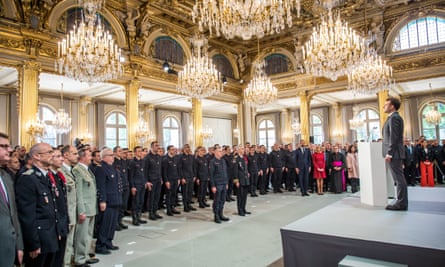 President Emmanuel Macron speaks to Parisian firefighters on Thursday.