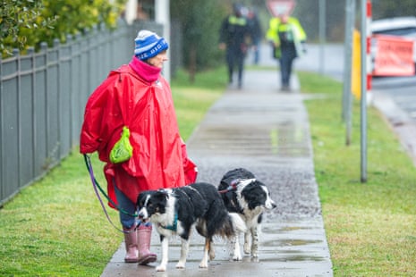 A Porepunkah resident walks her dogs