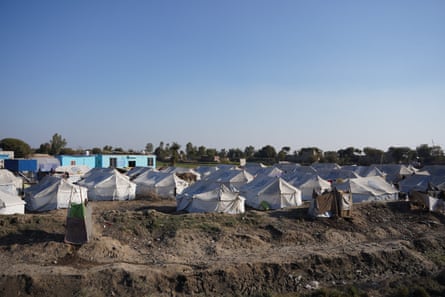 The tent city in Khairpur Nathan Shah, Dadu district, Pakistan, where Manzoor Ali and more than 50 families are still living in camps months after the floods.