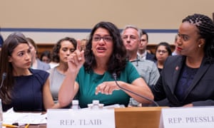 Rashida Tlaib reacts during testimony as Alexandria Ocasio-Cortez and Ayanna Pressley comfort her during a House hearing on the Trump administration’s child separation policy.