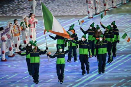 Ireland’s flag bearers Brendan Newby and Elsa Desmond lead their delegation.