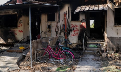The burnt-out remains of a house at Israel’s kibbutz Kissufim near Gaza that was attacked by Hamas militants on 7 October.