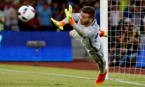 Angus Gunn makes a save during the shootout as Manchester City won 6-5 on penalties.