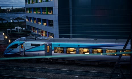 A TransPennine Express train approaches Piccadilly station in Manchester.
