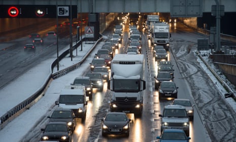 Heavy traffic on the M25 motorway near junction 25, as heavy snowfall across parts of the UK causes widespread disruption