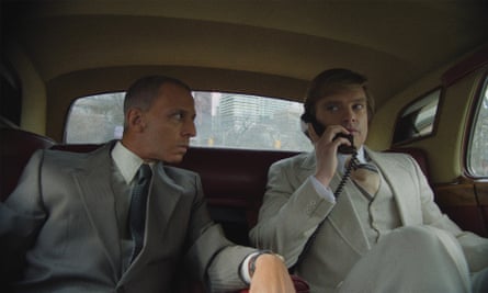 Jeremy Strong and Sebastian Stan sitting in the backseat of a limousine. 