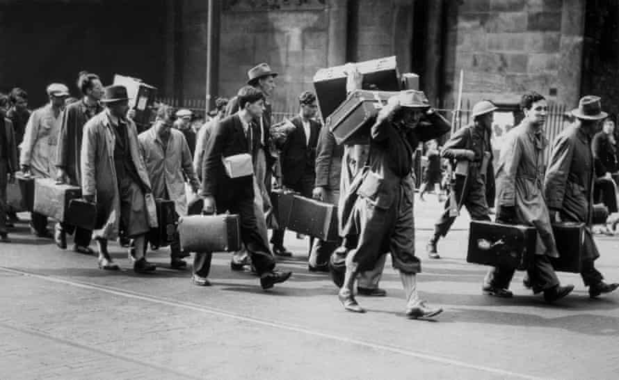 A group of people designated as ‘enemy aliens’ on their way to an internment camp in Britain in 1940.