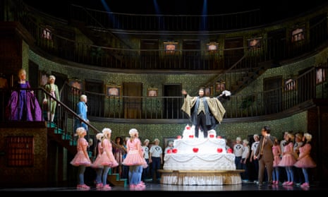 L to R on stairs: Venera Gimadieva as Donna Anna, Ruzan Mantashyan as Donna Elvira, Oleksiy Palchykov as Don Ottavio with Andrey Zhilikhovsky (centre on cake) as Don Giovanni &amp; Mikhail Timoshenko (R) as Lepoello and members of The Glyndebourne Chorus in 