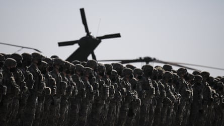 US soldiers line up during the visit of Nato secretary general Jens Stoltenberg at the Mihail Kogălniceanu airbase, near Constanta, Romania, February 2022.