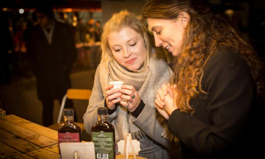Visitors to the mindful drinking festival sample some of the wares.