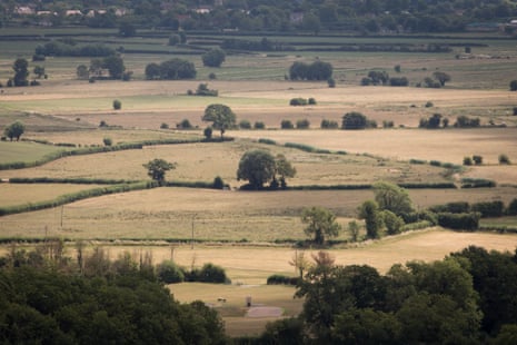 Dry fields seen from Glastonbury Tor in Somerset, England. 