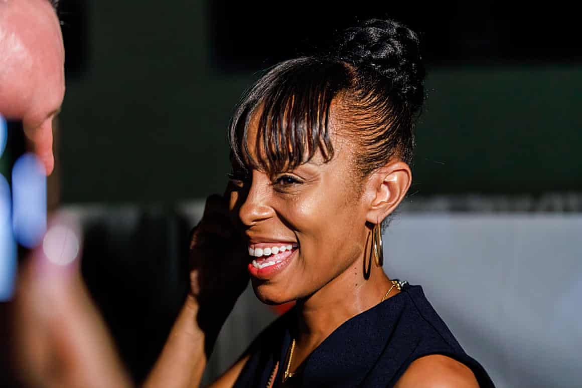 Shontel Brown gets on the phone after learning she won Ohio’s 11th Congressional District at her watch party in Bedford Heights on 3 August 2021.