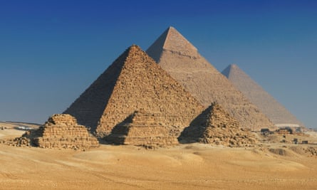 The Pyramids of Giza, Cairo, Egypt. The Great Pyramid is in the centre.