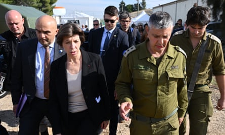 The French foreign minister, Catherine Colonna, centre left, visits the Shura army base near Ramle in Israel on Sunday.
