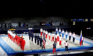 Athletes wearing protective masks amid the coronavirus outbreak take part in the opening ceremony of Friendship and Solidarity Competition, the first international event at a Tokyo Olympic venue since the Games were postponed in March due to the Covid-19 pandemic, in Tokyo, Japan, 8 November 2020.