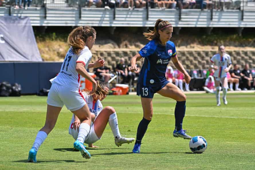 Alex Morgan (right) in action against OL Reign in June.