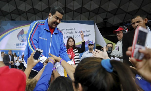 Nicolás Maduro greets supporters during a meeting with the National Union of Women in Caracas on Thursday. 