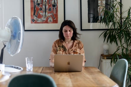 Paris-based reporter Megan Clement, seven months pregnant, working from home during a record-breaking heat wave in France and across much of Europe.