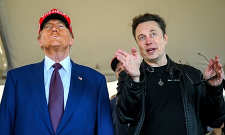 Donald Trump listens to Elon Musk as he arrives to watch SpaceX’s mega rocket Starship lift off for a test flight from Starbase in Boca Chica, Texas, on 19 November.
