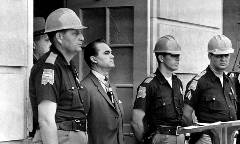 Alabama governor George Wallace blocked the entrance to the University of Alabama to prevent black students from enrolling, 1963.