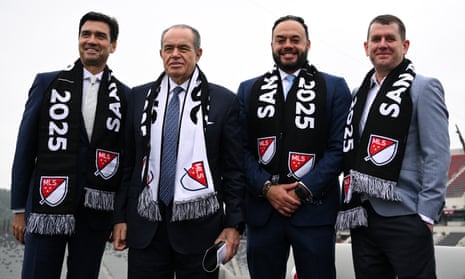 San Diego FC co-owner Mohamed Mansour and Sycuan Band of the Kumeyaay Nation tribal chairman Cody Martinez pose for a photograph with San Diego FC chief executive officer Tom Penn and Right to Dream founder Tom Vernon during a press conference at Snapdragon Stadium on Thursday.