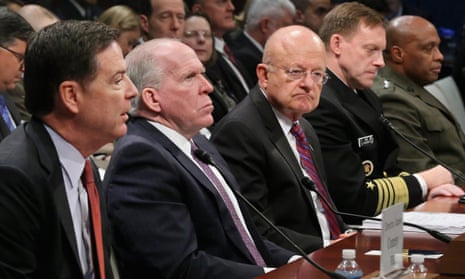 The FBI director, James Comey, CIA director, John Brennan, Director of National Intelligence James Clapper, National Security Agency director Admiral Michael Rogers and Defense Intelligence Agency director, Lieutenant General Vincent Stewart, testify during an open hearing of the House Intelligence Committee on Thursday.