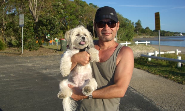 Kunihiko Hashimoto with his pet dog in 2014.