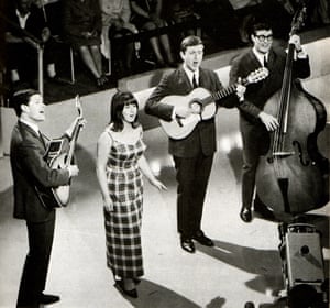 Group performing on stage L-R Keith Potger, Judith Durham, Bruce Woodley and Athol Guy
